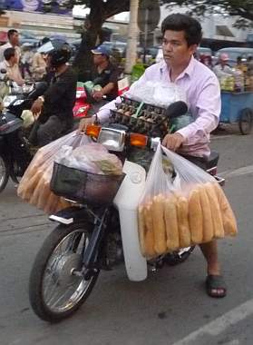 Motorcycle load of bread and eggs